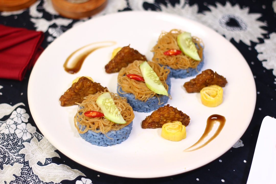 Traditional dish of Sundanese people from West Java with a unique ingredients for "blue" rice which is a herb flower, Bunga Telang or Butterfly pea flower.